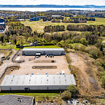 Aerial view of Blocks 11 and 12 at Wester Gourdie Industrial Estate, showing industrial units, yard space and surrounding greenery.