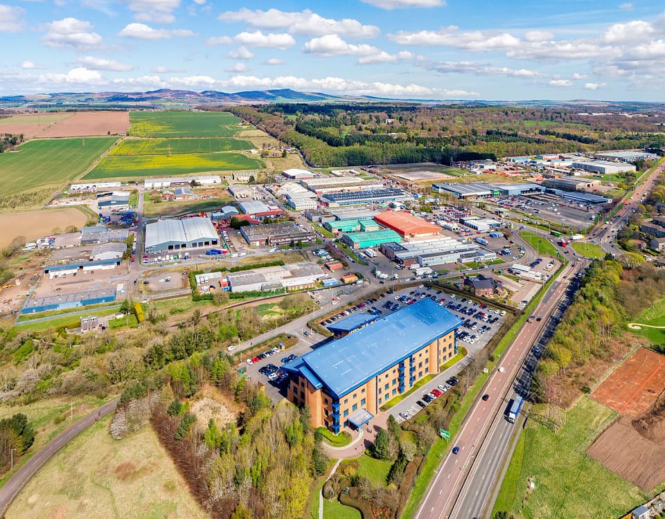 Wester Gourdie Industrial Estate in Dundee - Aerial image showing A90 Kingsway and surrounding industrial units